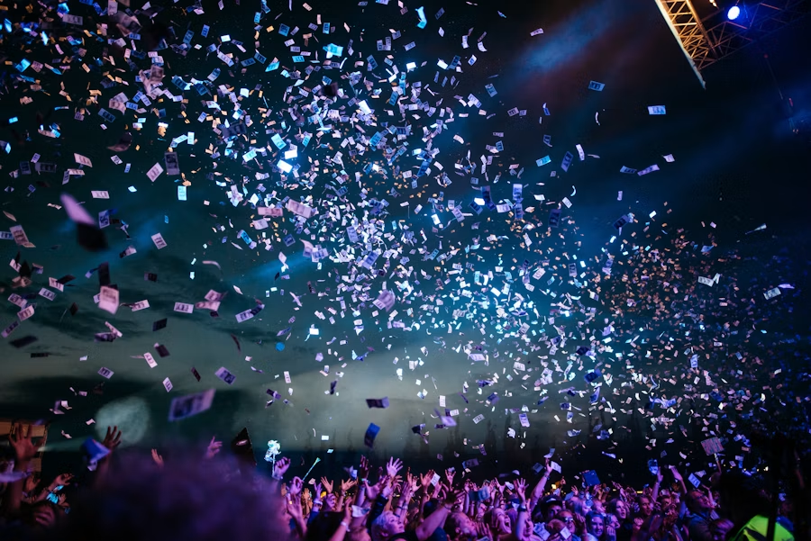 Large professional event with stage lighting and audience