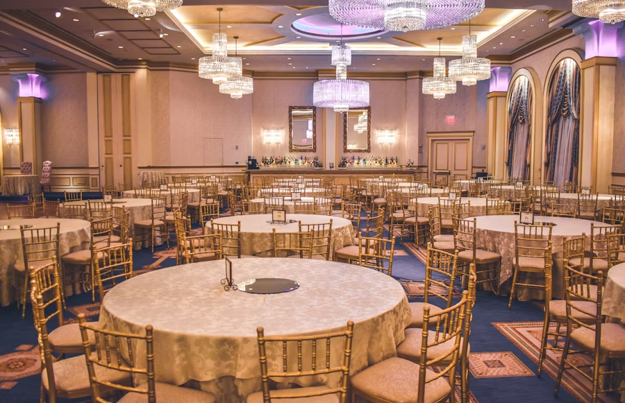 Formal event venue with tables and lighting